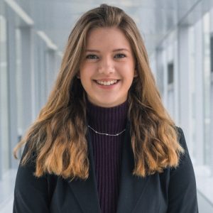 Young woman with long hair and smiling